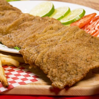 Chuleta valluna con arroz